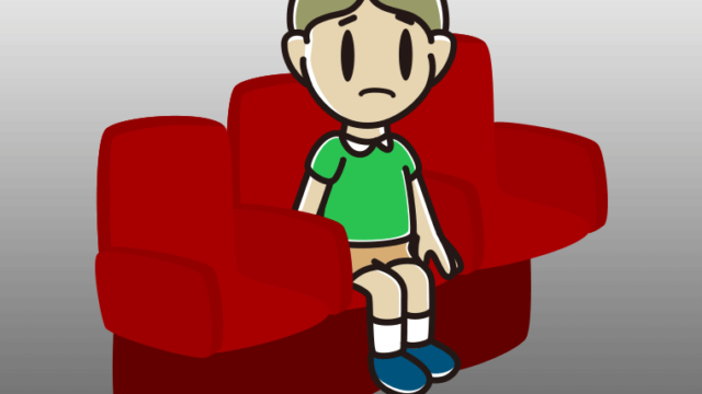 映画館（劇場）で困る小学生男子のイラスト【色、背景あり】PNG