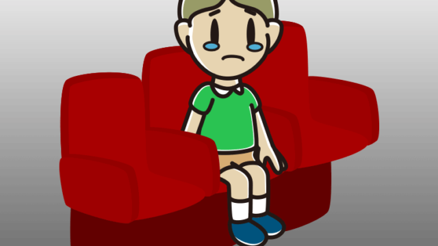 映画館（劇場）で泣く小学生男子のイラスト【色、背景あり】PNG