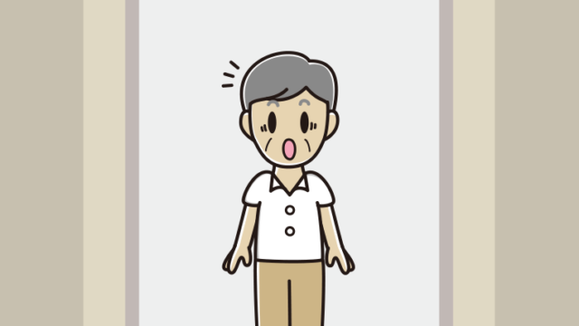 エレベーターで驚く年配男性会社員（クールビズ）
