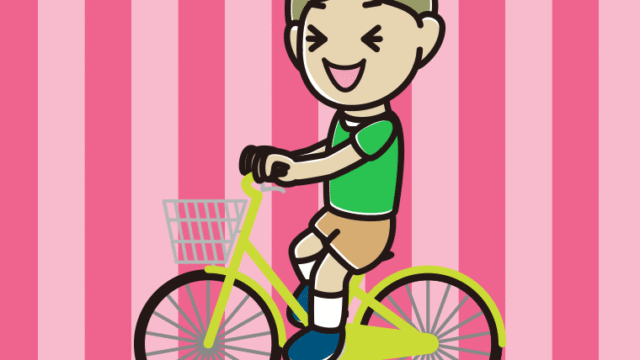 自転車に乗って笑う小学生男子のイラスト【色、背景あり】PNG