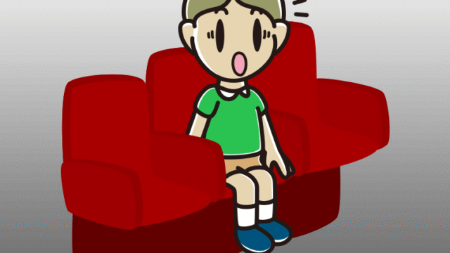 映画館（劇場）で驚く小学生男子のイラスト【色、背景あり】PNG