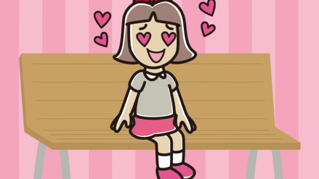 ベンチで目がハートの小学生女子のイラスト【色、背景あり】PNG