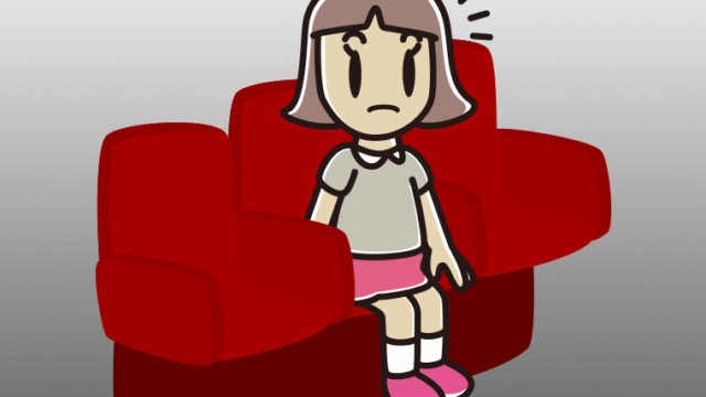 映画館（劇場）で何かに気付く小学生女子のイラスト【色、背景あり】PNG